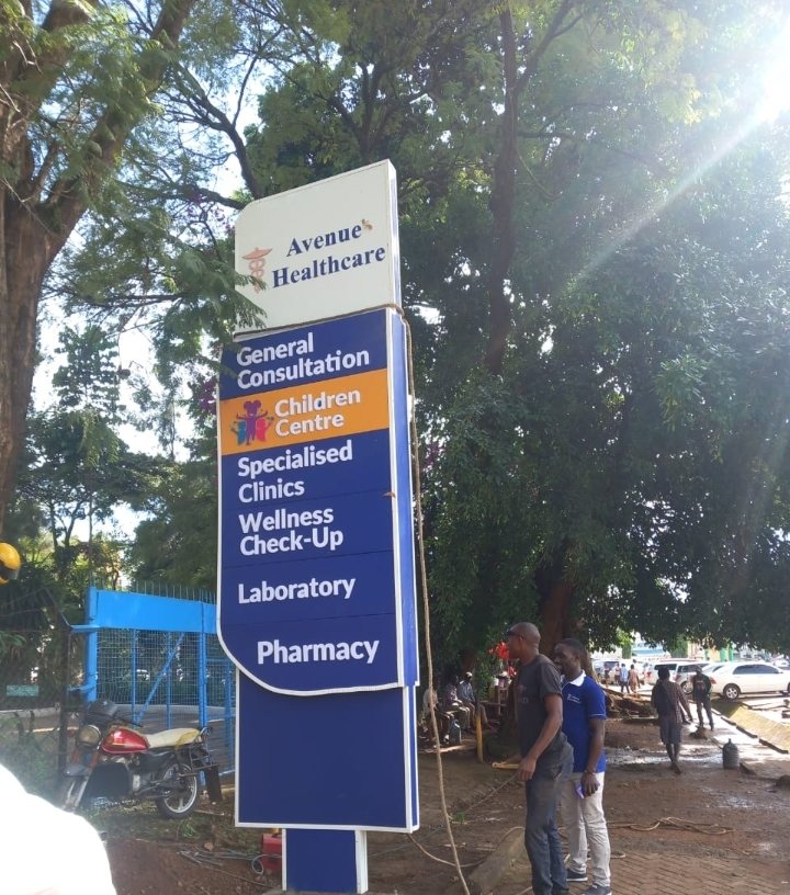 On-site installation of Avenue Healthcare wayfinding signage