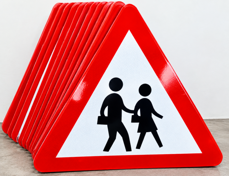 Road Signs In Nairobi Kenya Featuring Red Stop Signs, Warning Signs And Traffic Safety Signs Mounted on Metal Poles.