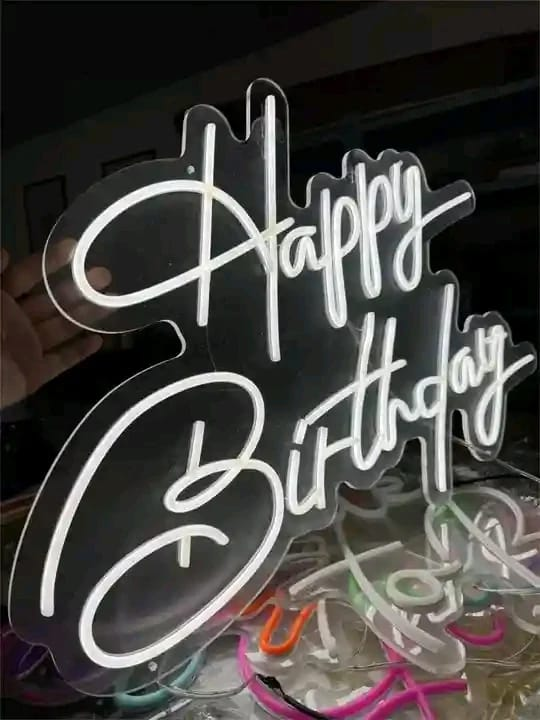 Custom white Happy Birthday LED neon sign on clear acrylic, Nairobi